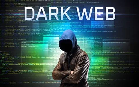 Faceless hacker on code background Stock Photos