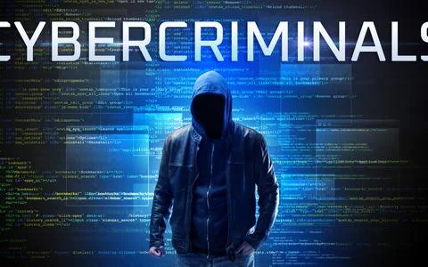Faceless hacker on code background Foto stock