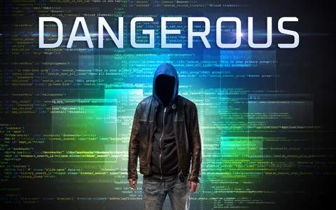 Faceless hacker on code background Foto stock