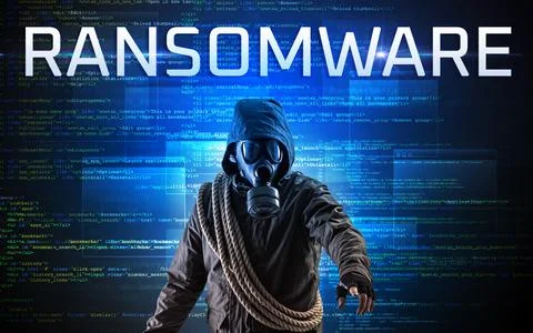 Faceless hacker on code background Stock Photos