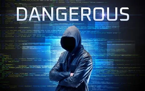 Faceless hacker on code background Foto stock