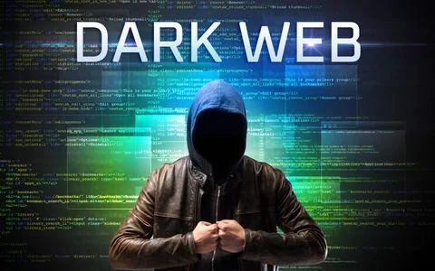 Faceless hacker on code background Stock Photos