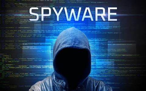 Faceless hacker on code background Foto stock