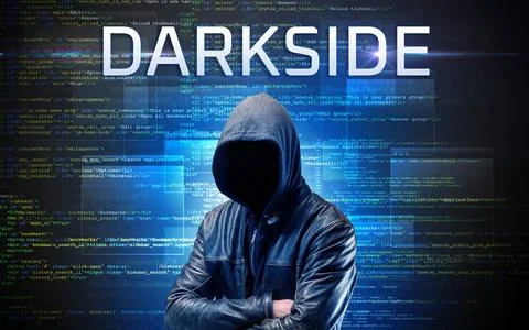Faceless hacker on code background Foto stock