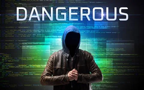 Faceless hacker on code background Stock Photos