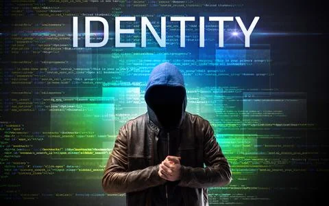 Faceless hacker on code background Foto stock