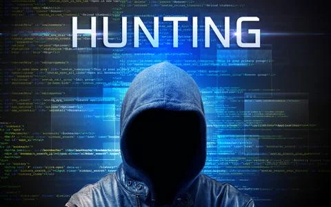 Faceless hacker on code background Stock Photos