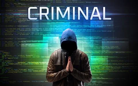 Faceless hacker on code background Foto stock