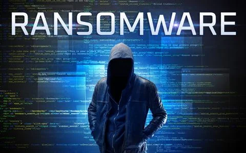 Faceless hacker on code background Foto stock