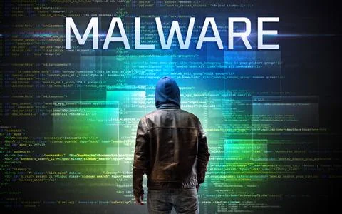 Faceless hacker on code background Foto stock