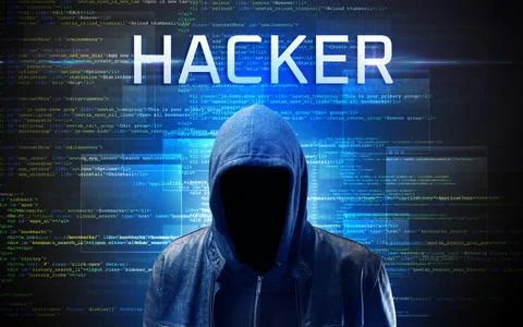 Faceless hacker on code background Stock Photos