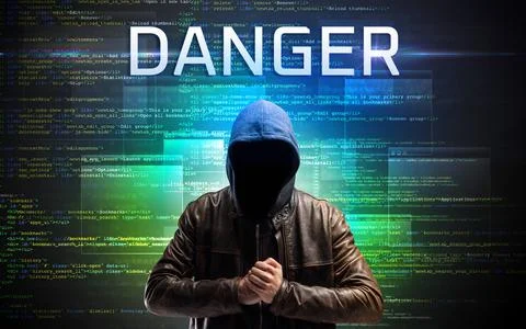 Faceless hacker on code background Foto stock