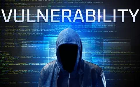 Faceless hacker on code background Foto stock