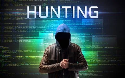 Faceless hacker on code background Stock Photos