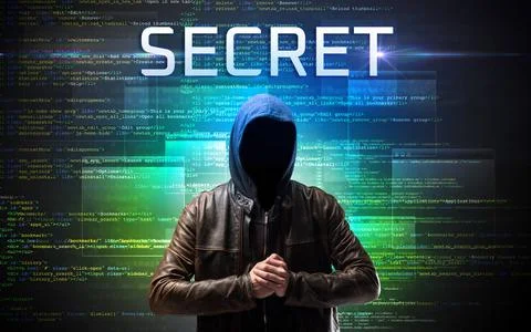 Faceless hacker on code background Stock Photos