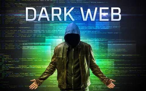 Faceless hacker on code background Foto stock
