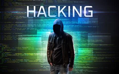 Faceless hacker on code background Stock Photos
