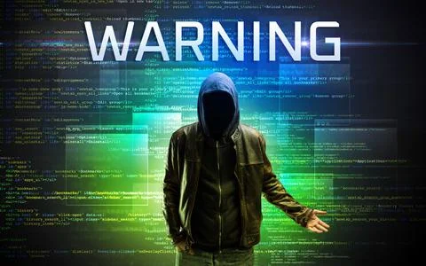 Faceless hacker on code background Stock Photos