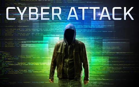 Faceless hacker on code background Foto stock