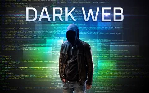 Faceless hacker on code background Foto stock