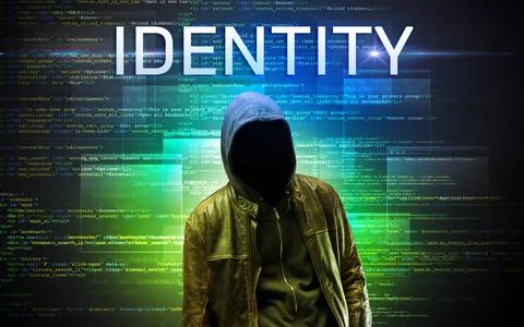 Faceless hacker on code background Stock Photos