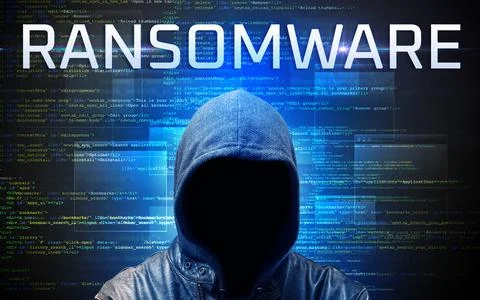 Faceless hacker on code background Stock Photos