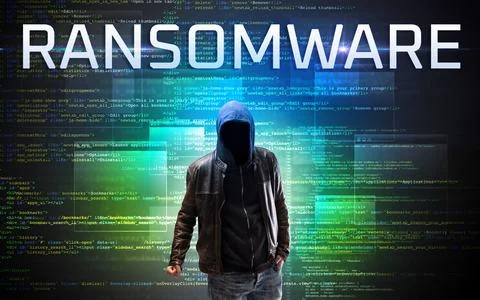 Faceless hacker on code background Stock Photos