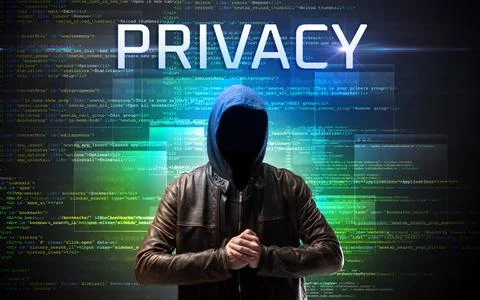 Faceless hacker on code background Foto stock