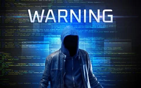 Faceless hacker on code background Stock Photos