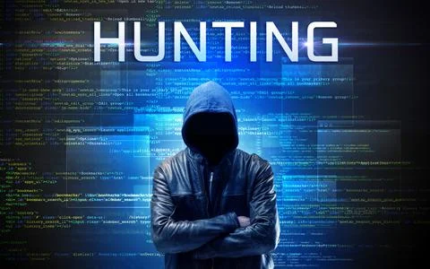 Faceless hacker on code background Stock Photos