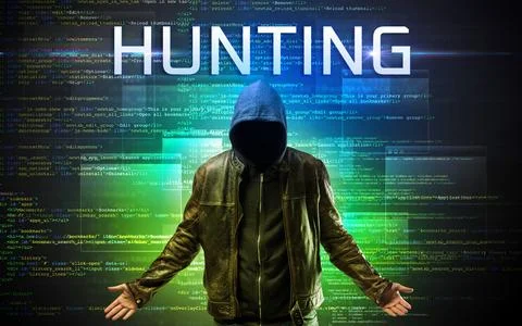 Faceless hacker on code background Stock Photos