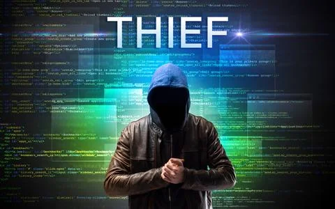 Faceless hacker on code background Stock Photos