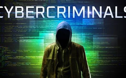 Faceless hacker on code background Stock Photos