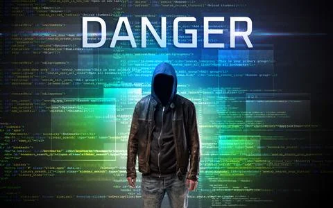 Faceless hacker on code background Foto stock