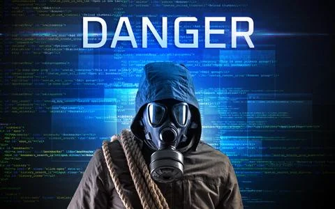 Faceless hacker on code background Stock Photos