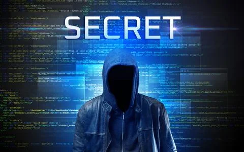 Faceless hacker on code background Foto stock