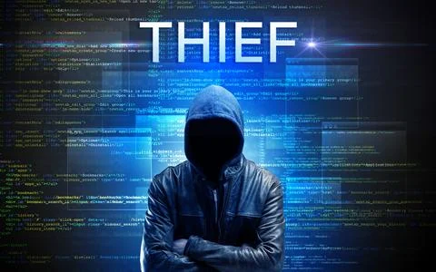 Faceless hacker on code background Foto stock
