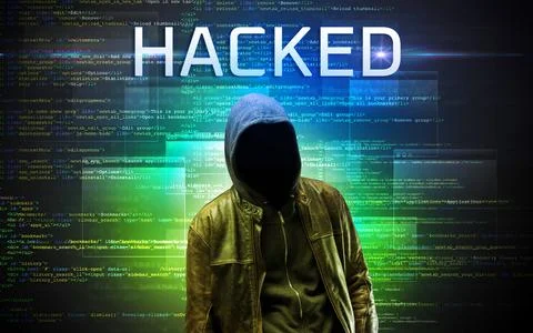 Faceless hacker on code background Stock Photos