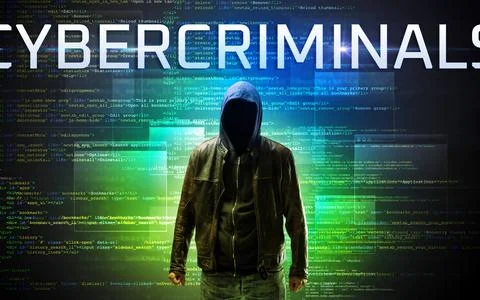 Faceless hacker on code background Foto stock