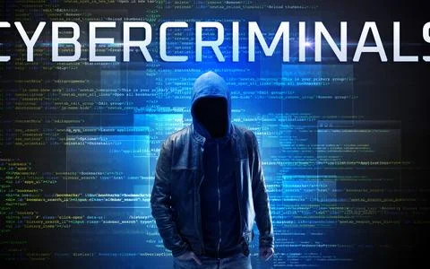 Faceless hacker on code background Stock Photos