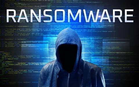 Faceless hacker on code background Stock Photos