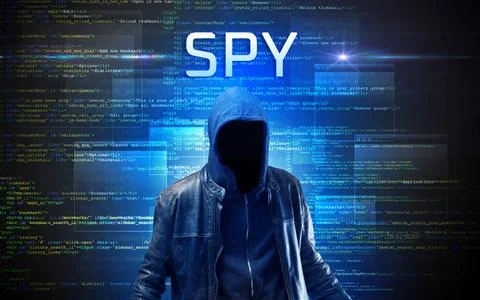 Faceless hacker on code background Stock Photos