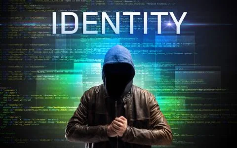 Faceless hacker on code background Stock Photos