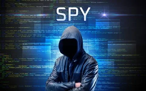 Faceless hacker on code background Foto stock