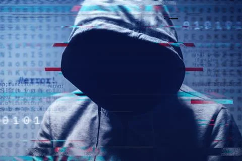 Faceless hooded hacker surrounded by digital computer code and binary digit.. Stock Photos