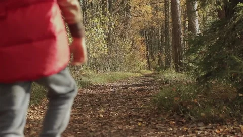 Faceless man child walking together along lake river bank on summer holidays.  動画素材 129221969
