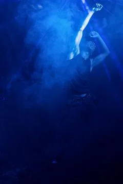 Faceless man dancing in studio Foto stock