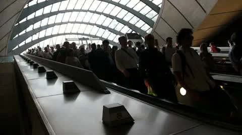 Faceless people on escalator Stock Footage