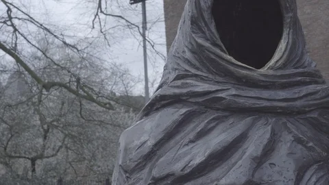 Faceless statue with castle background Stock Footage 126112520