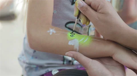 Facepainting on arm Stock Footage 40465683